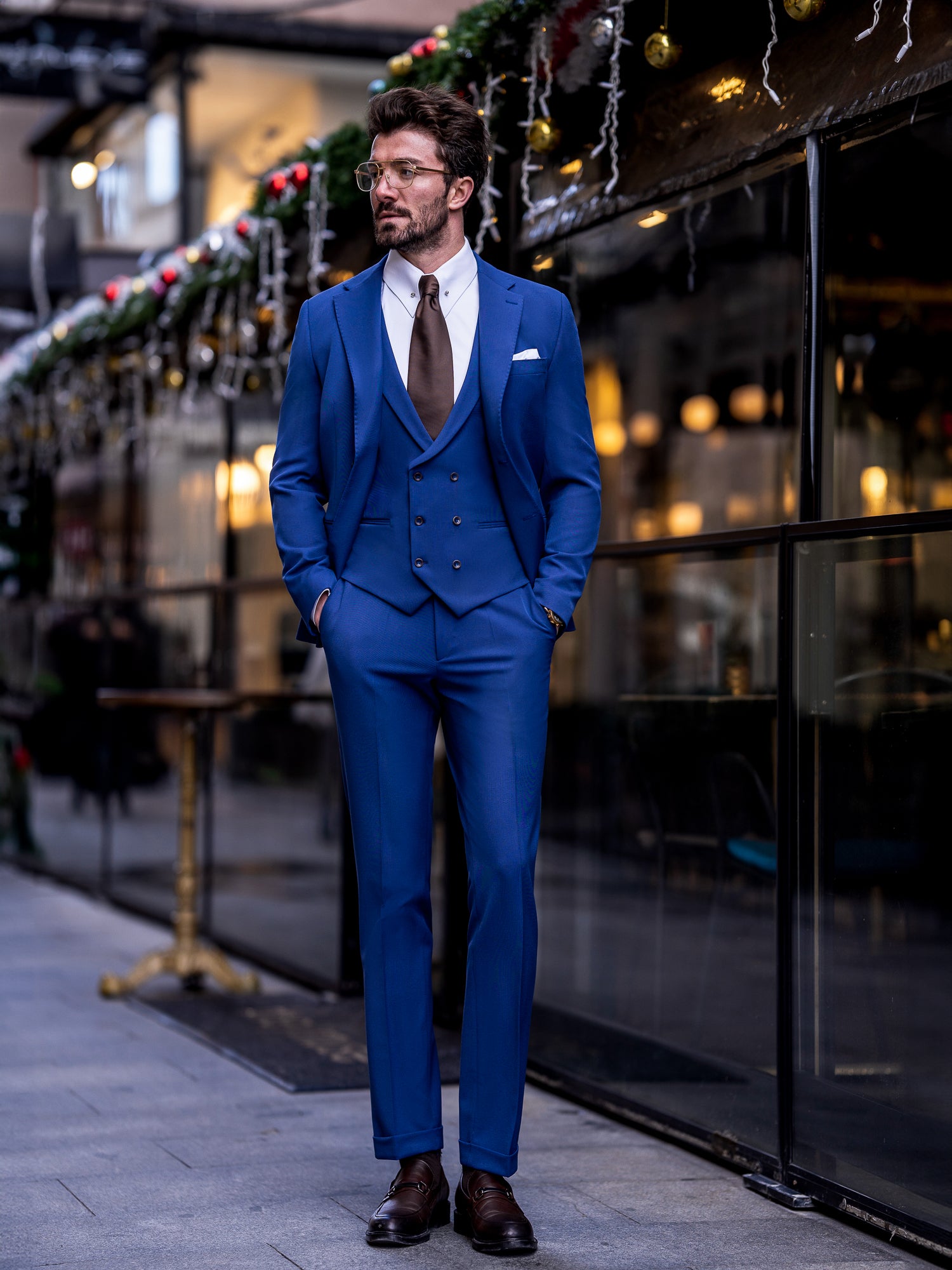 VIOSSI navy slim-fit suit 3-piece jacket detail showcasing italian suit styles design for light blue wedding suit look