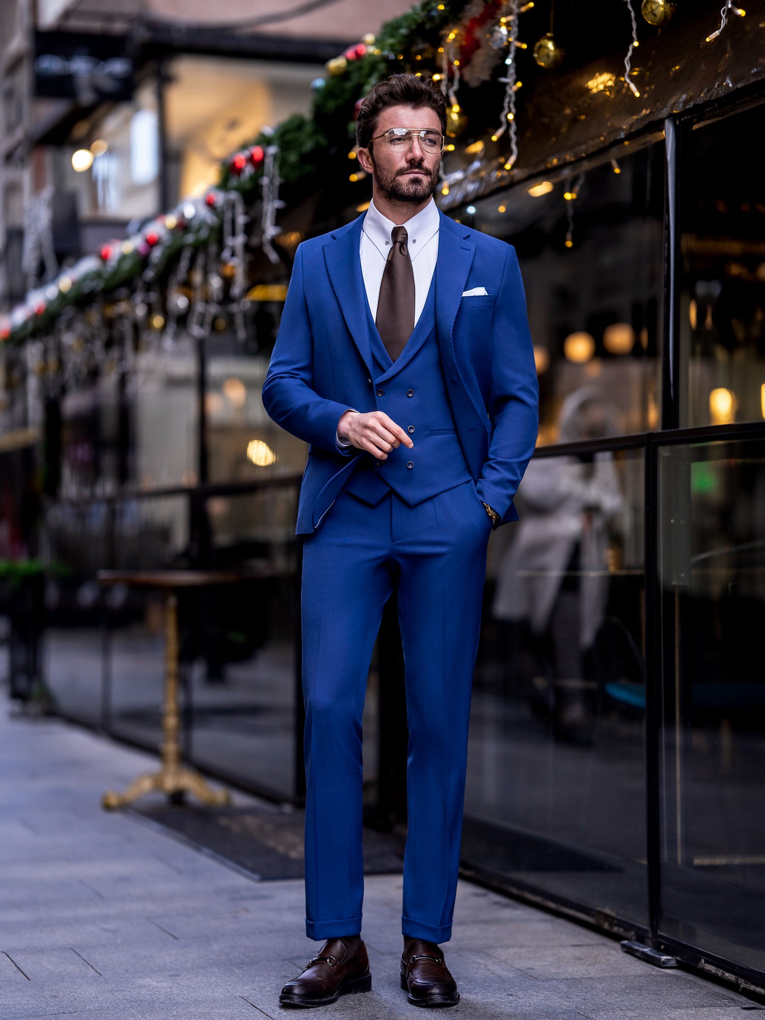 VIOSSI navy slim-fit suit 3-piece side angle displaying italian suit styles cut ideal for light blue wedding suit style
