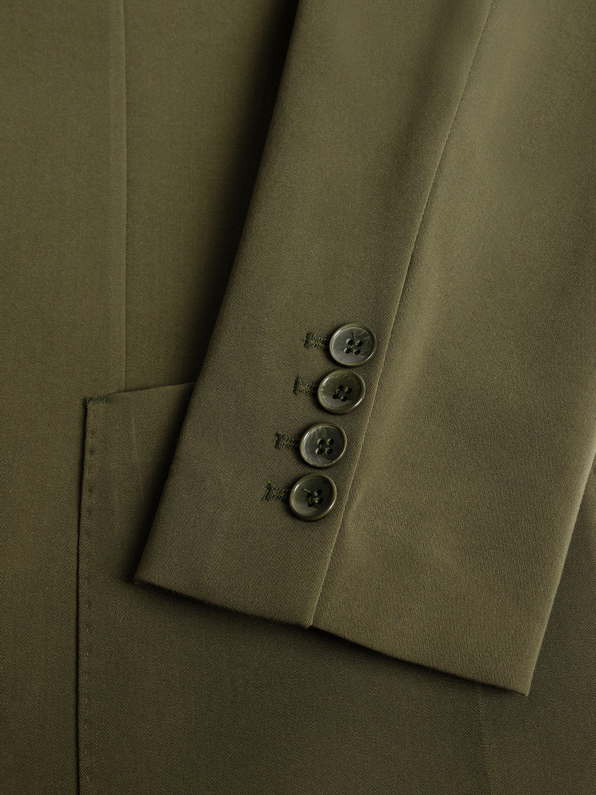 VIOSSI London Khaki double breasted blazer styled look with model wearing complete outfit