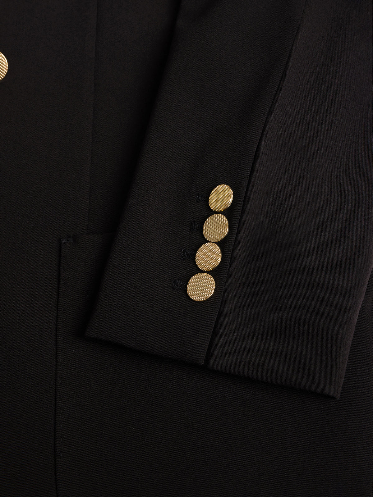 VIOSSI London Black Double Breasted Blazer detail shot - men double breasted blazer showing button and lapel craftsmanship