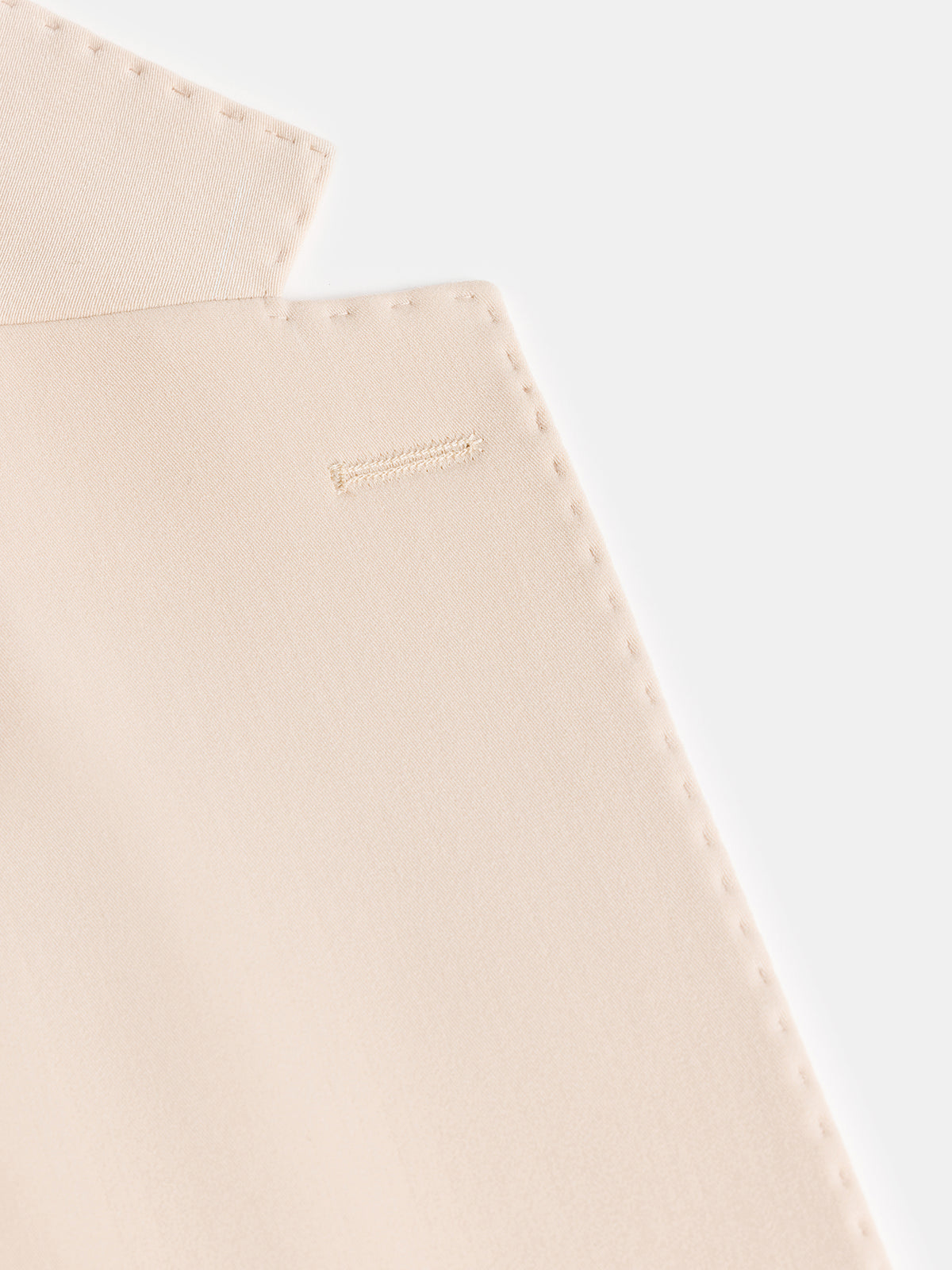 VIOSSI London Beige double breasted blazer detail view of lapel construction and tailoring finish