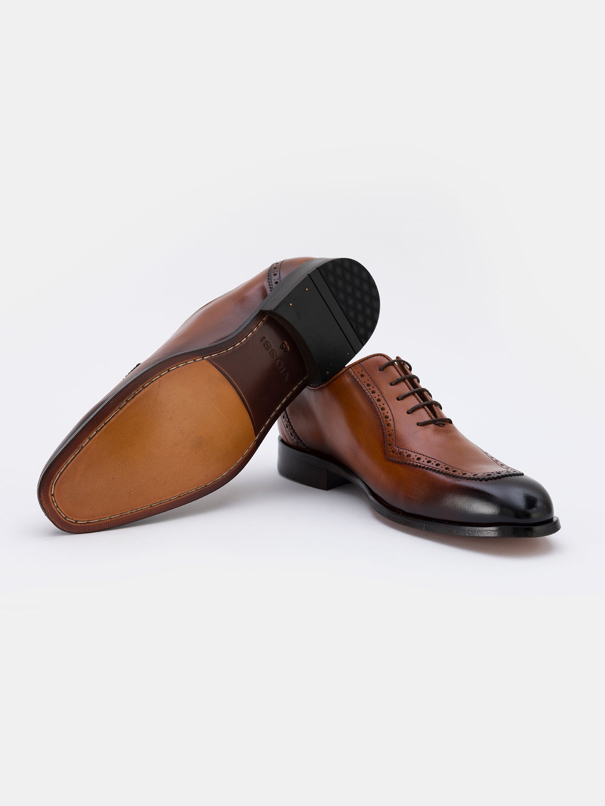VIOSSI brown wingtips Oxford detailed close-up of perforated wing tip pattern and leather craftsmanship
