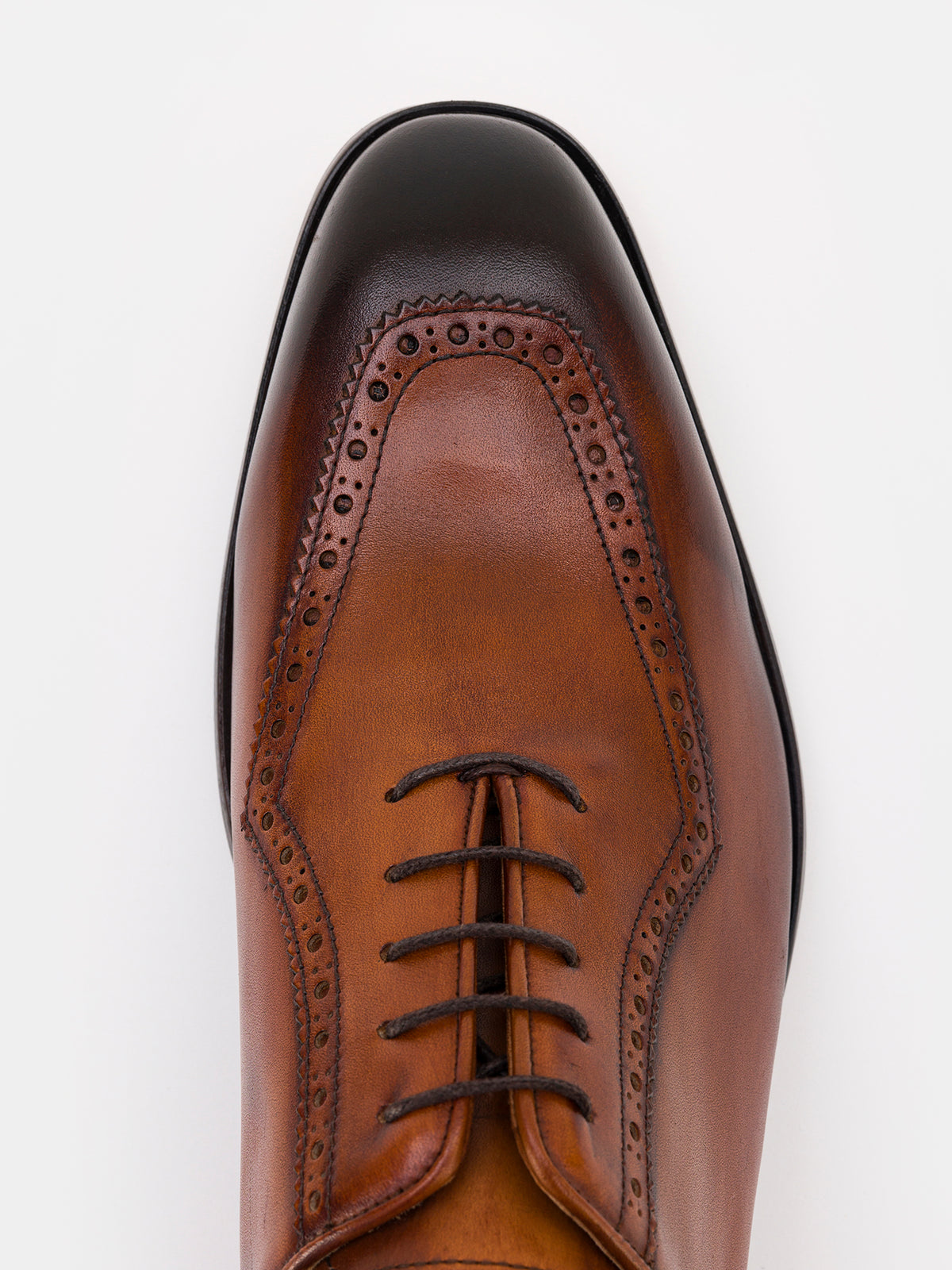 VIOSSI brown wingtips Oxford on model - lifestyle shot demonstrating formal shoe styling and fit