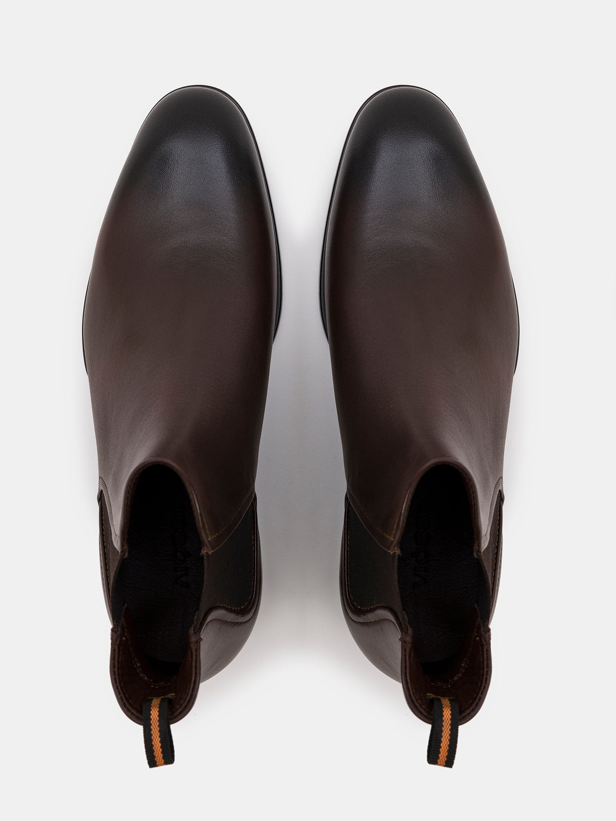 VIOSSI brown leather Chelsea boots close-up texture view, classic choice for blue suit brown shoes pairing