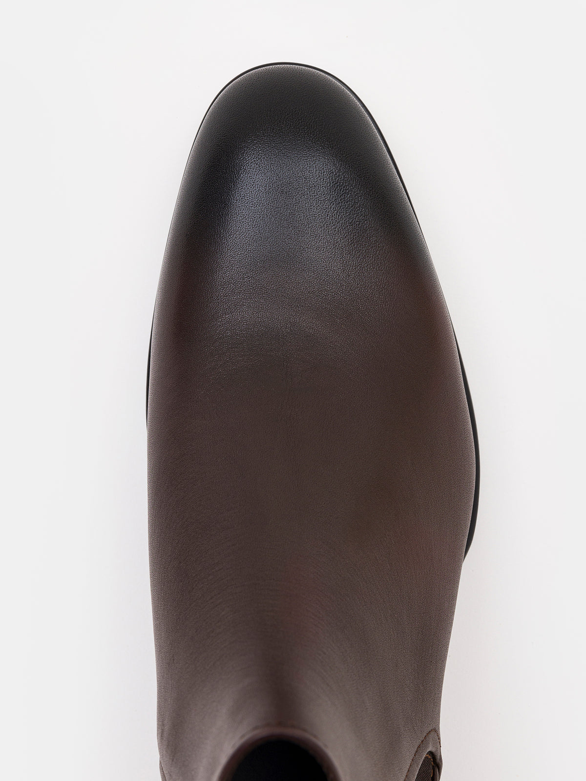 VIOSSI brown leather Chelsea boots on model wearing brown suit, demonstrating sophisticated styling