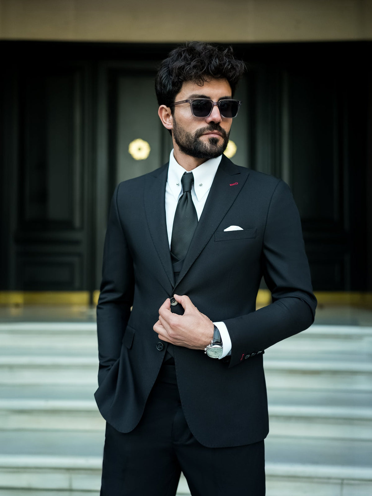 VIOSSI Black Modern-Fit Suit 3-Piece jacket detail shot highlighting button stance and italian suit styles lapels