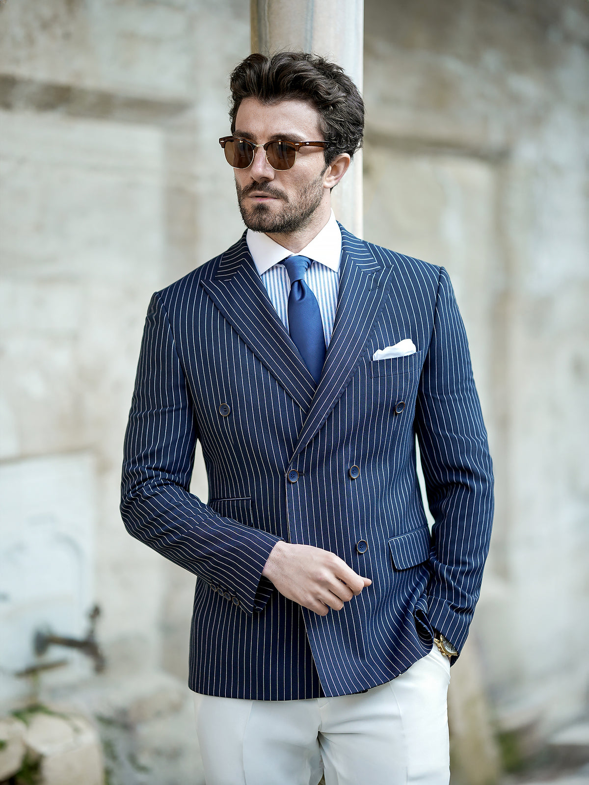 VIOSSI navy striped double breasted blazer worn with dress shirt - men double breasted blazer outfit styling