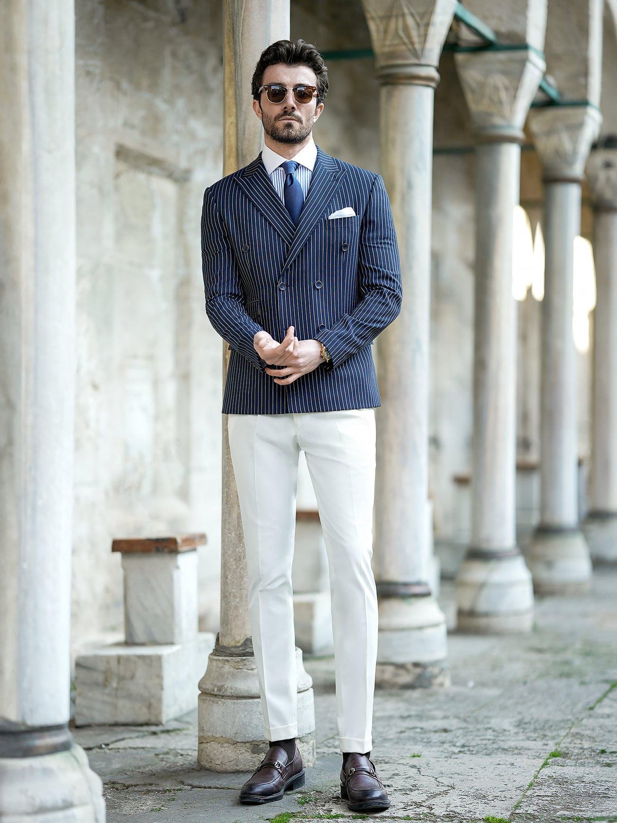 VIOSSI navy striped double breasted blazer styled on model - tuxedo double breasted formal menswear
