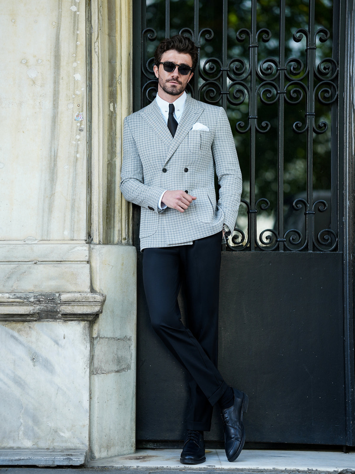 VIOSSI grey houndstooth tuxedo double breasted blazer side profile displaying peak lapels and button details