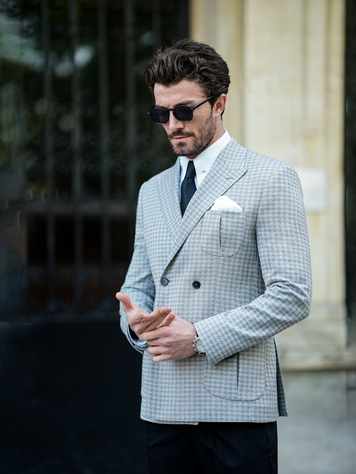 VIOSSI grey houndstooth men double breasted blazer close-up of lapel construction and finishing details