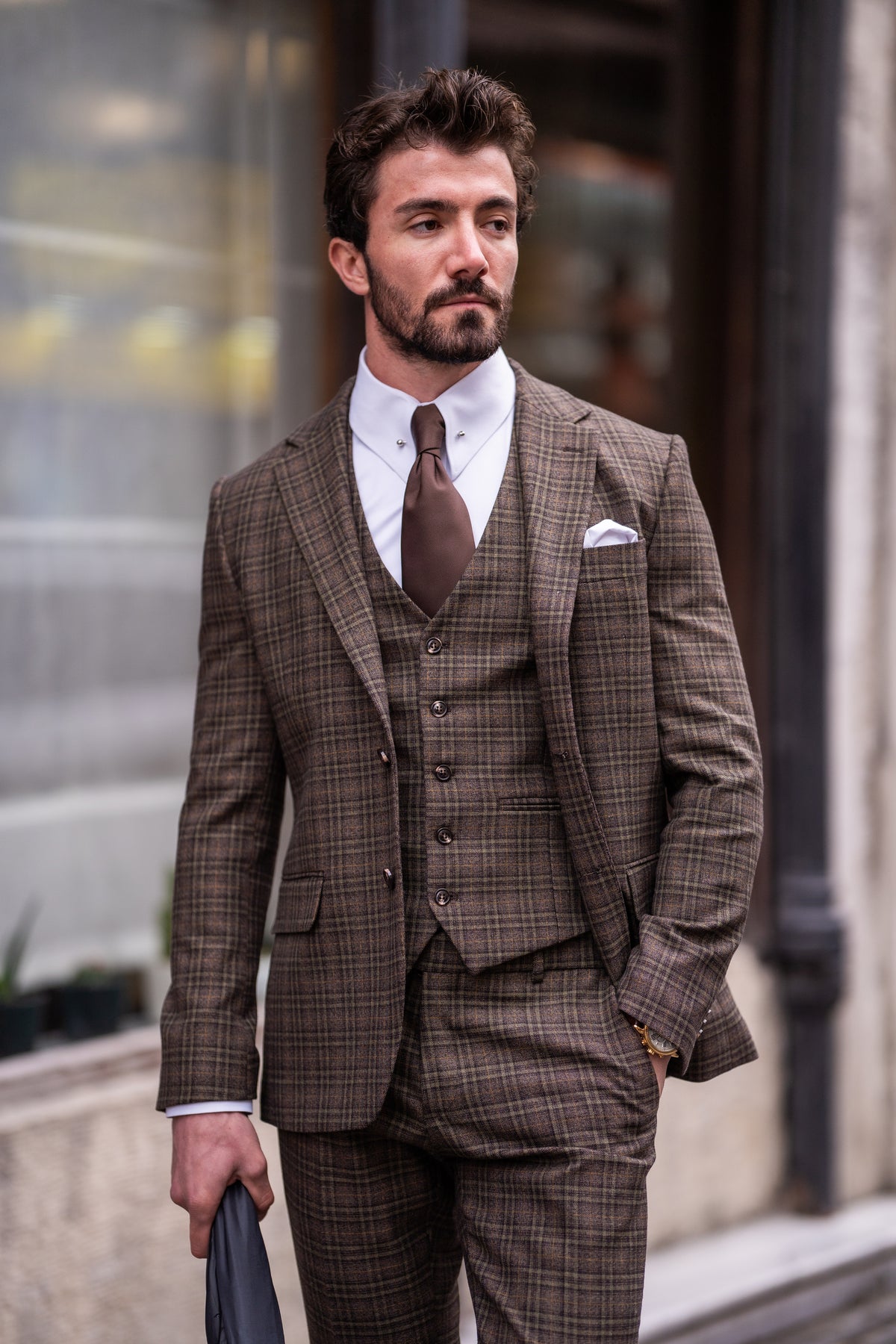 VIOSSI Brown Plaid Slim-Fit Suit 3-Piece styled on model - sophisticated light blue wedding suit alternative