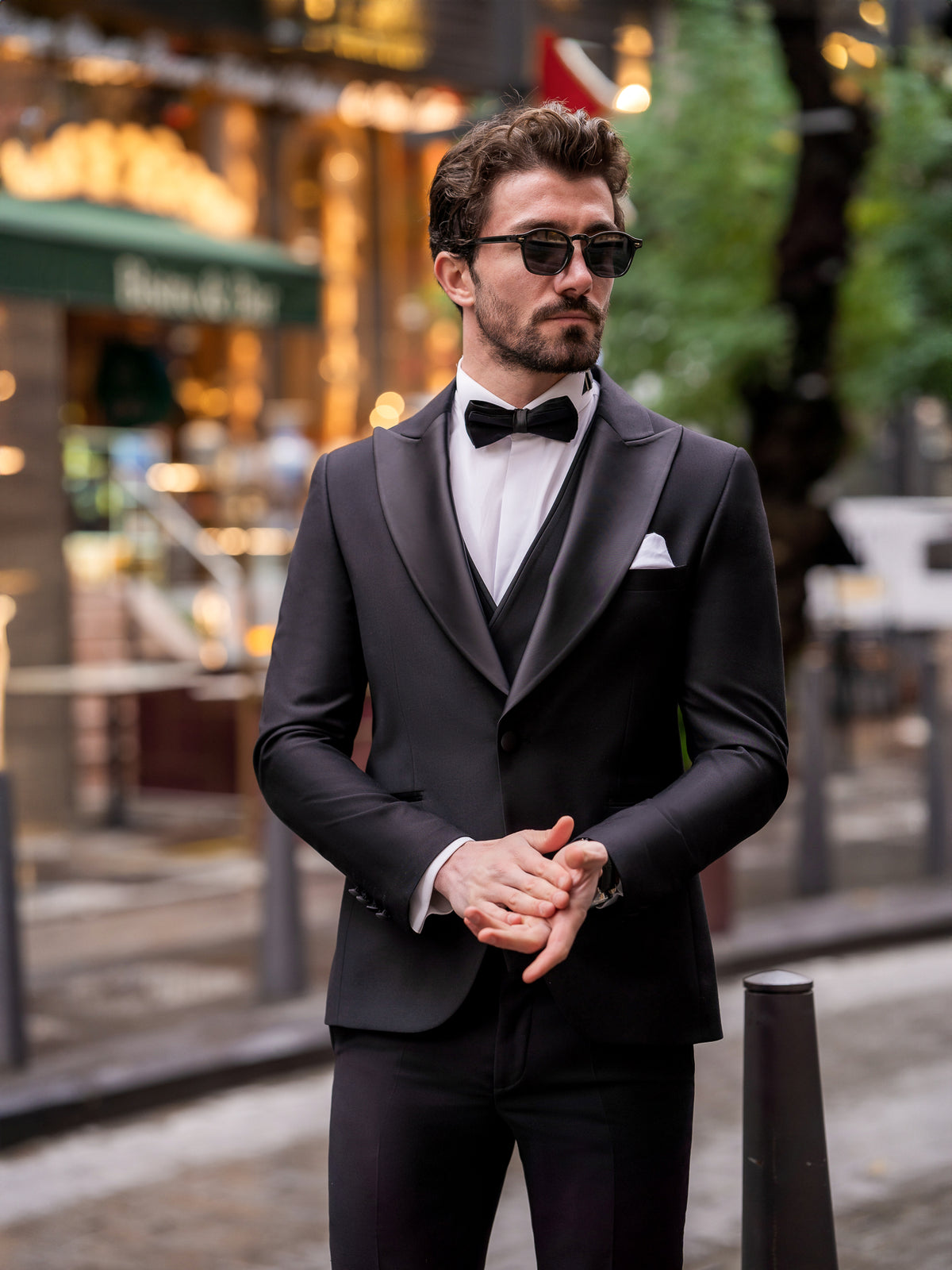 VIOSSI black slim-fit double breasted tuxedo detail shot of lapels and button styling