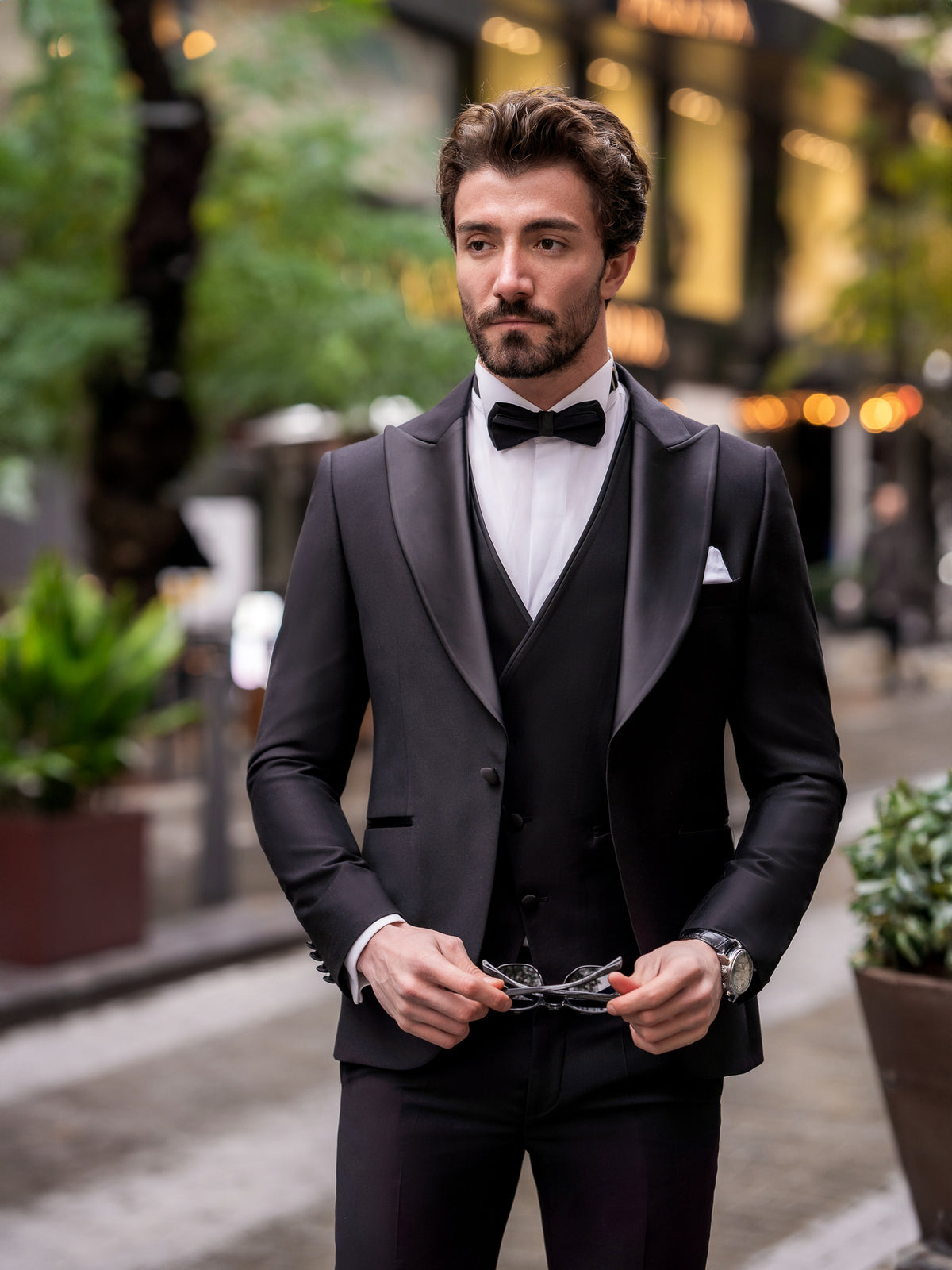 VIOSSI black tuxedo double breasted jacket close-up showing peak lapels and satin detailing