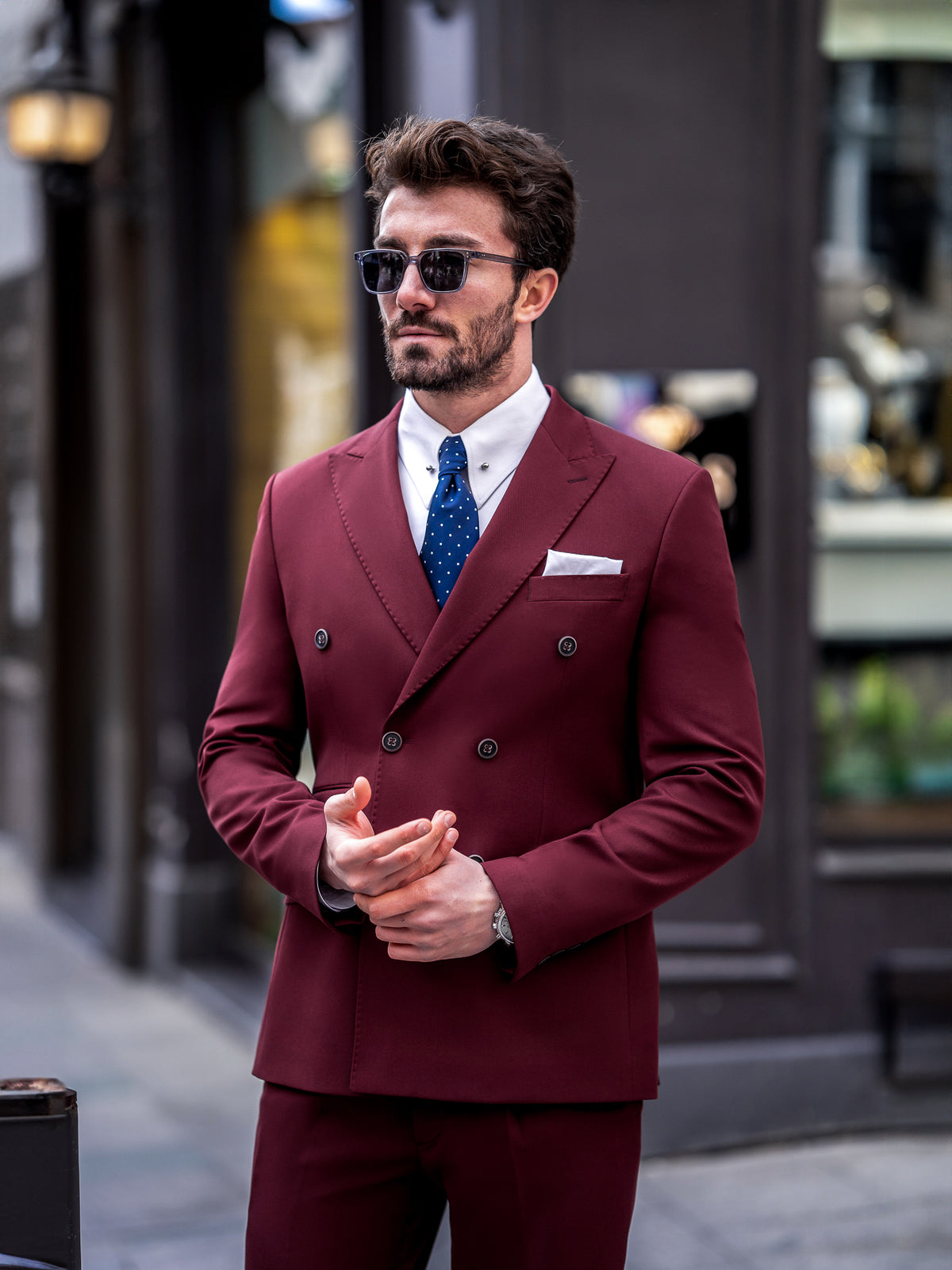 VIOSSI bordeaux double breasted suit 2-piece detail shot of buttons and Italian suit styles craftsmanship