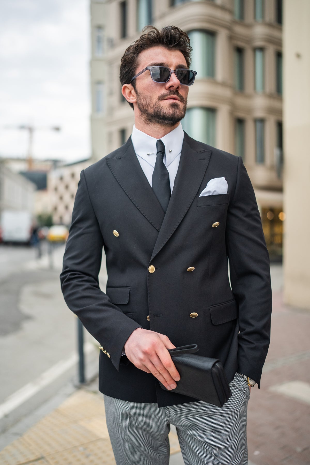 VIOSSI black double breasted blazer three-quarter view - tuxedo double breasted showing shoulder and chest fit