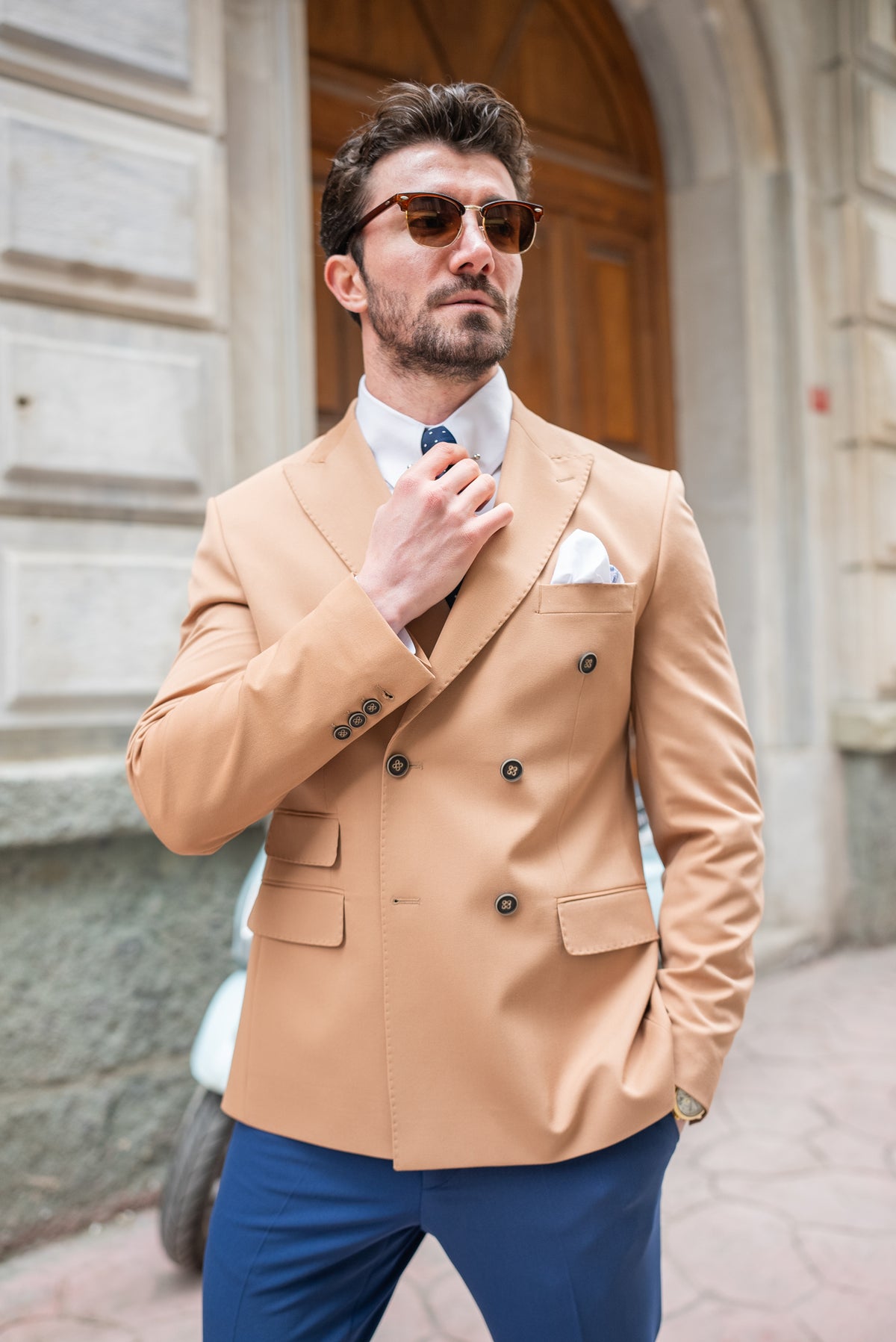 VIOSSI camel double breasted blazer worn styled with dress shirt and accessories