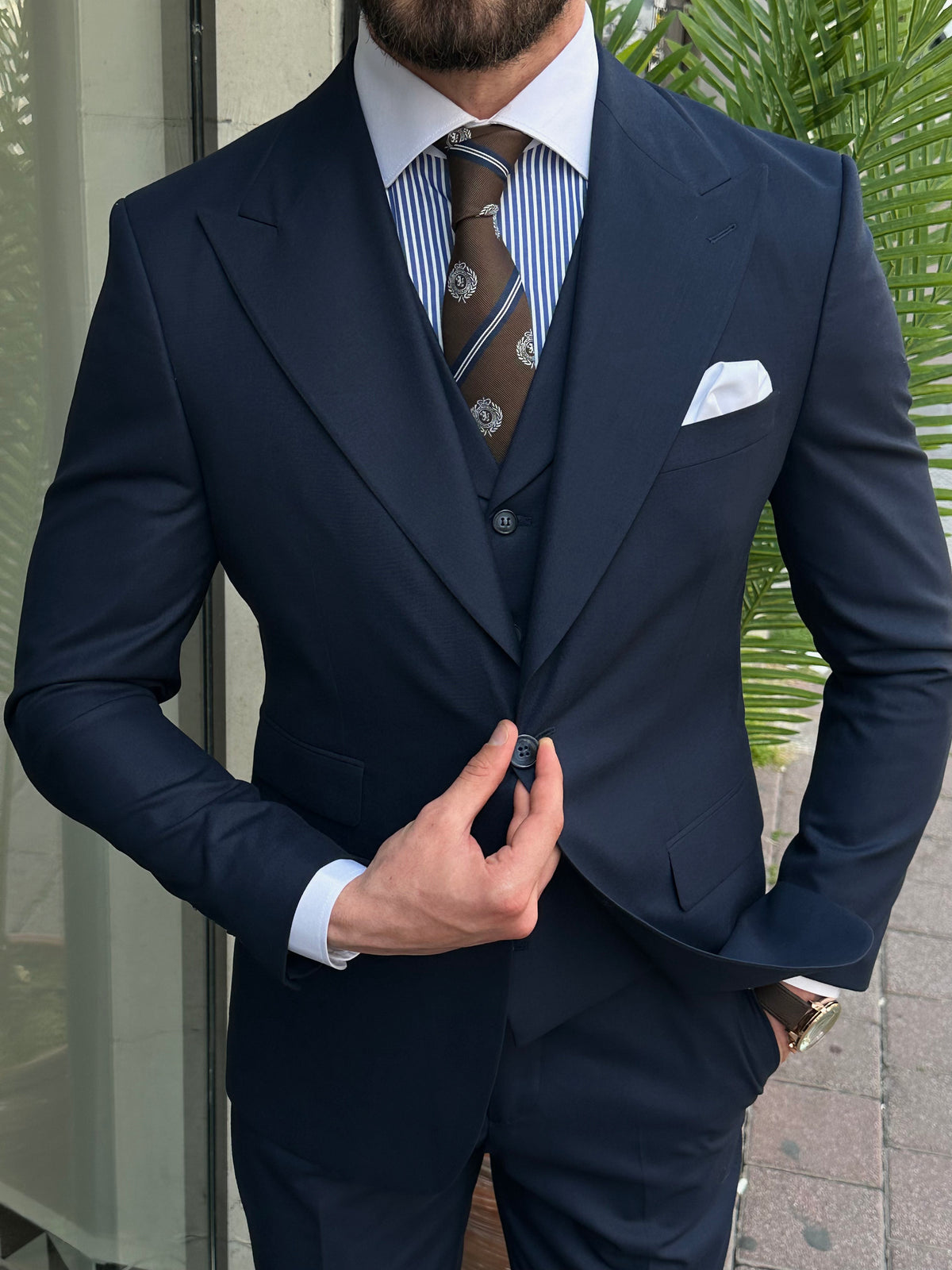 VIOSSI navy slim-fit 3-piece suit vest closeup - Italian suit styles with matching waistcoat for complete look