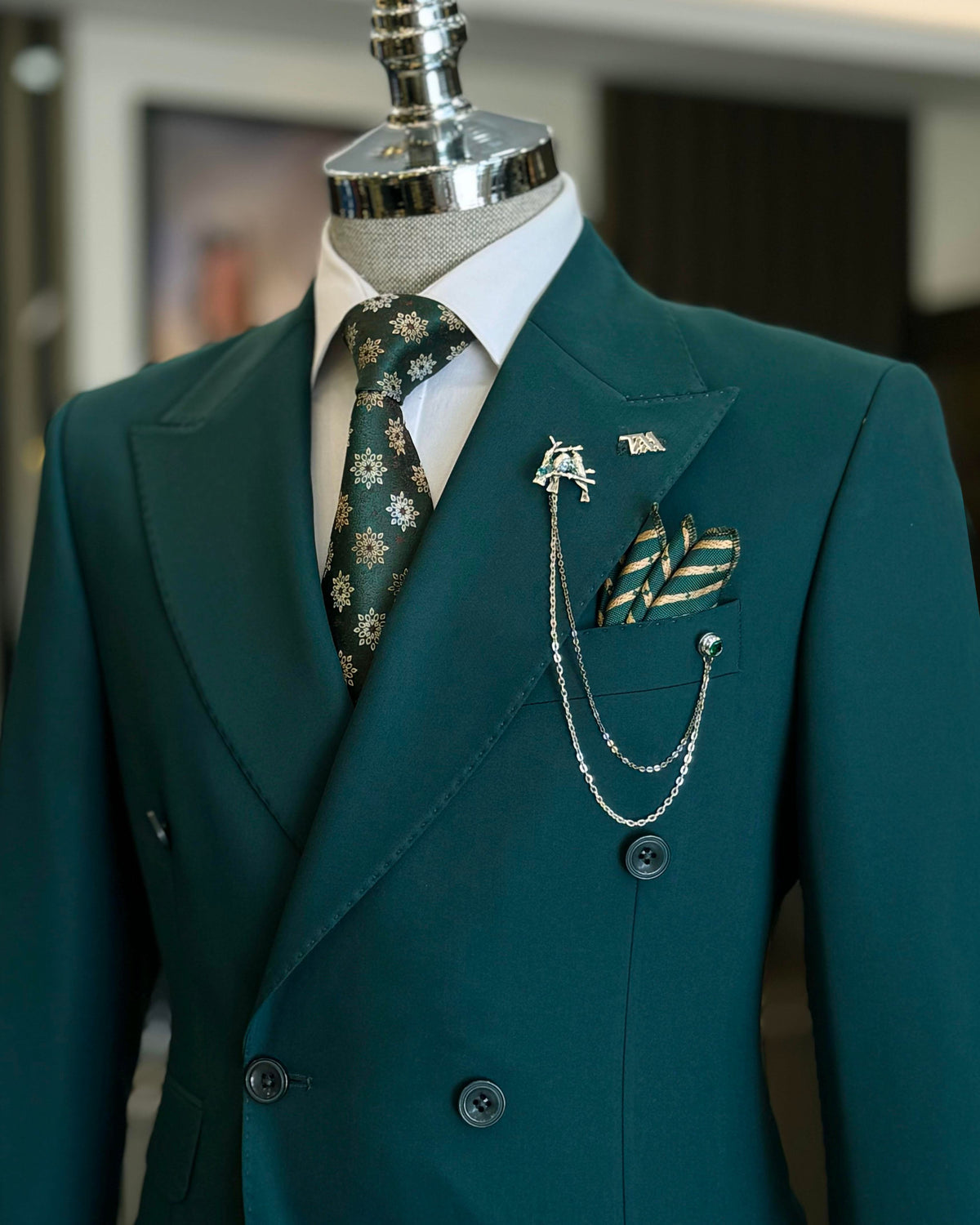 VIOSSI green tuxedo double breasted suit 2-piece set shown from front view with peaked lapels and structured silhouette
