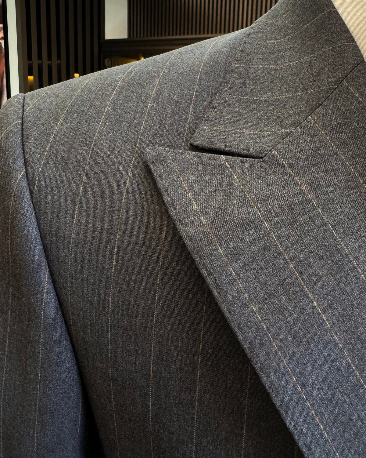 VIOSSI grey striped double breasted tuxedo back view displaying Italian suit styles tailoring