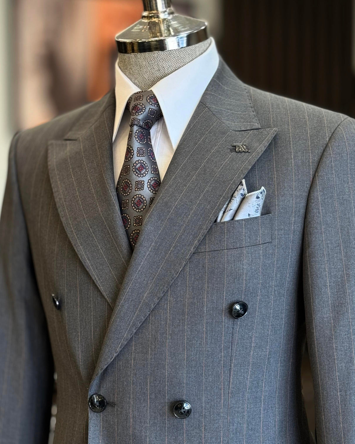 VIOSSI grey striped double breasted tuxedo suit close-up of Italian suit styles construction details