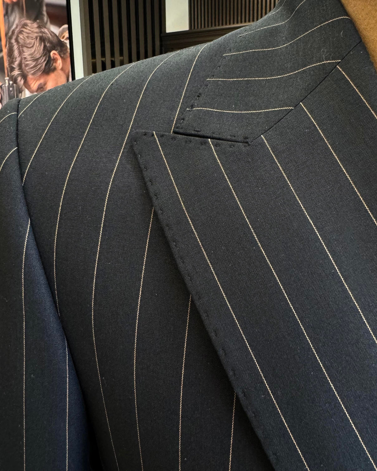 VIOSSI black striped double breasted tuxedo detail view highlighting Italian suit styles finishing