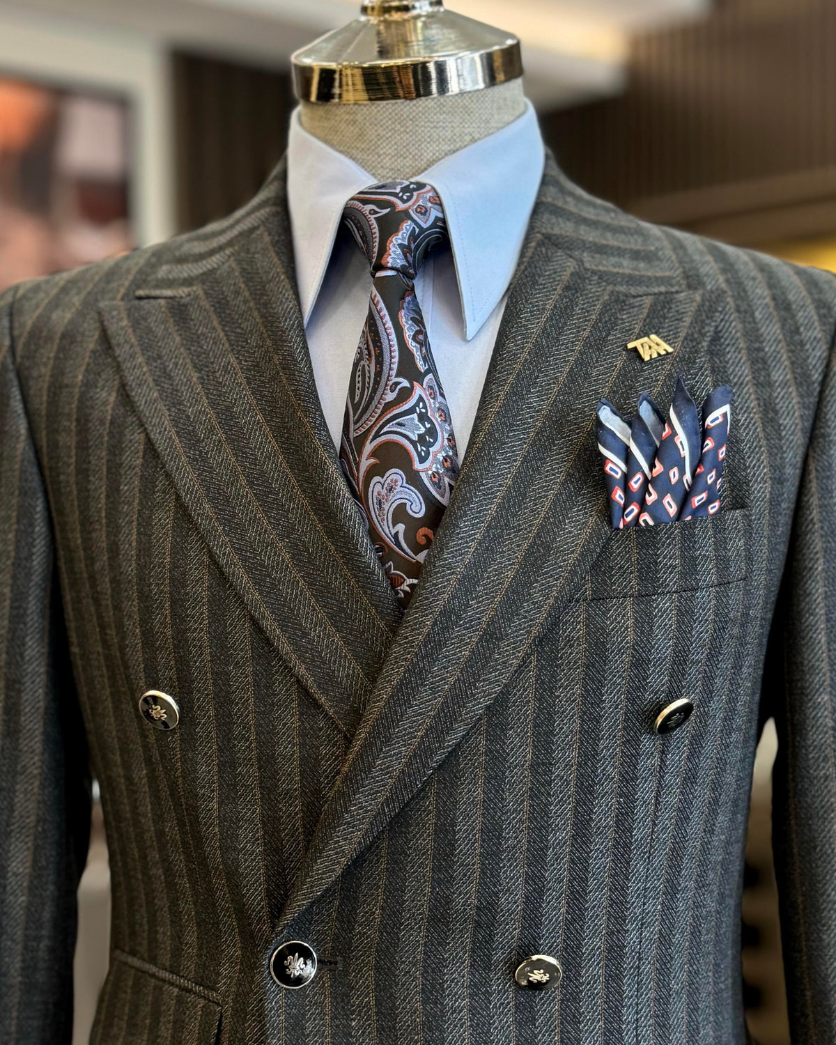 VIOSSI grey striped double breasted suit 2-piece detail image of tuxedo double breasted button configuration