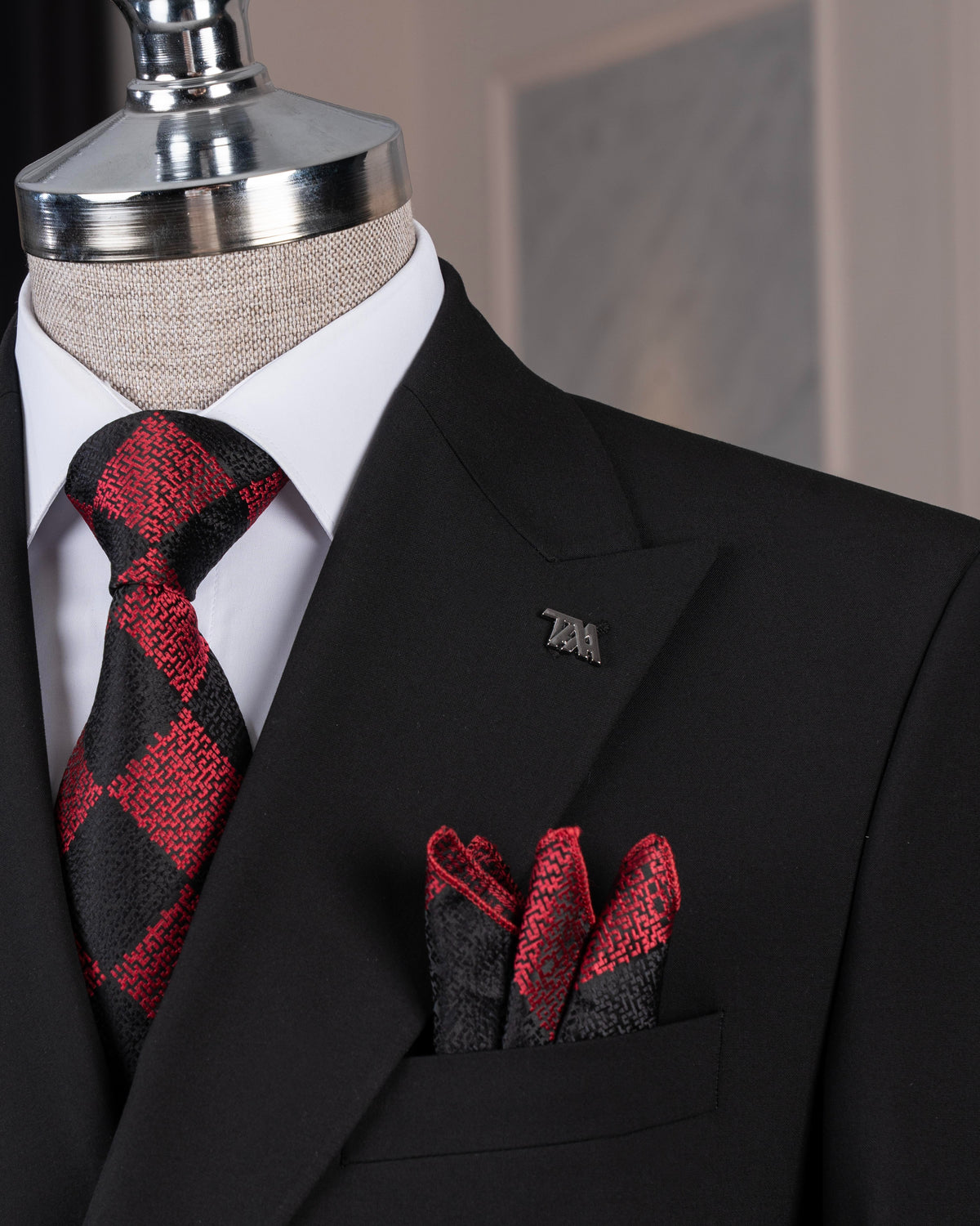 Black double-breasted suit – structured silhouette with button detail, side view