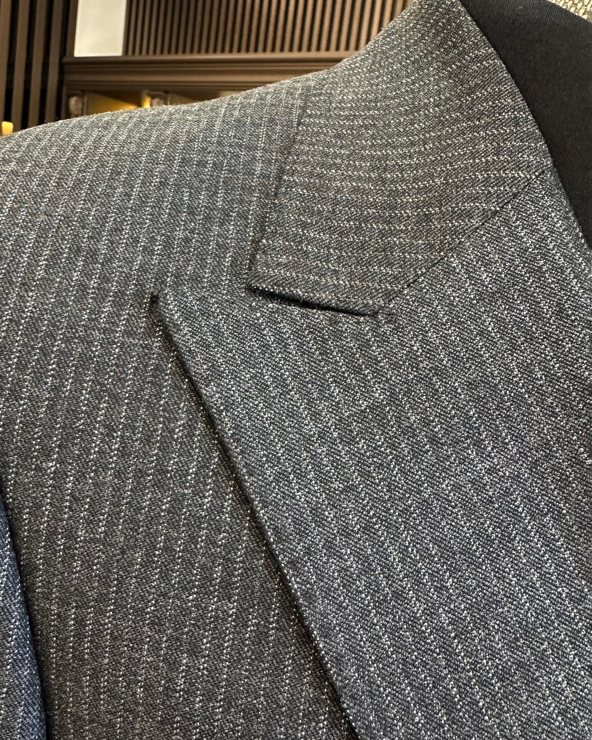 VIOSSI grey striped tuxedo double breasted 2-piece suit front view with peak lapels and italian suit styles design