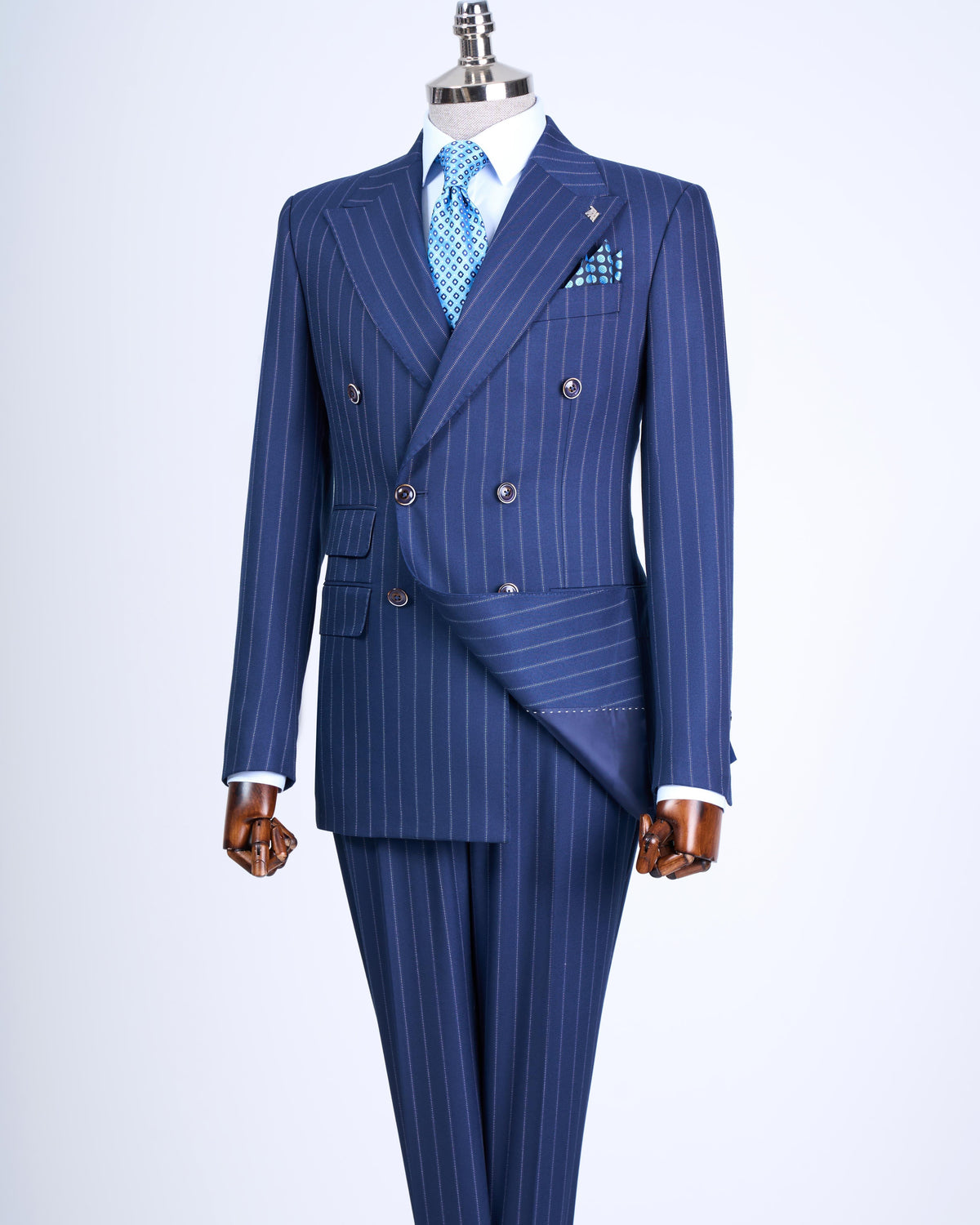VIOSSI navy striped tuxedo double breasted suit 2-piece front view with peak lapels and italian suit styles design