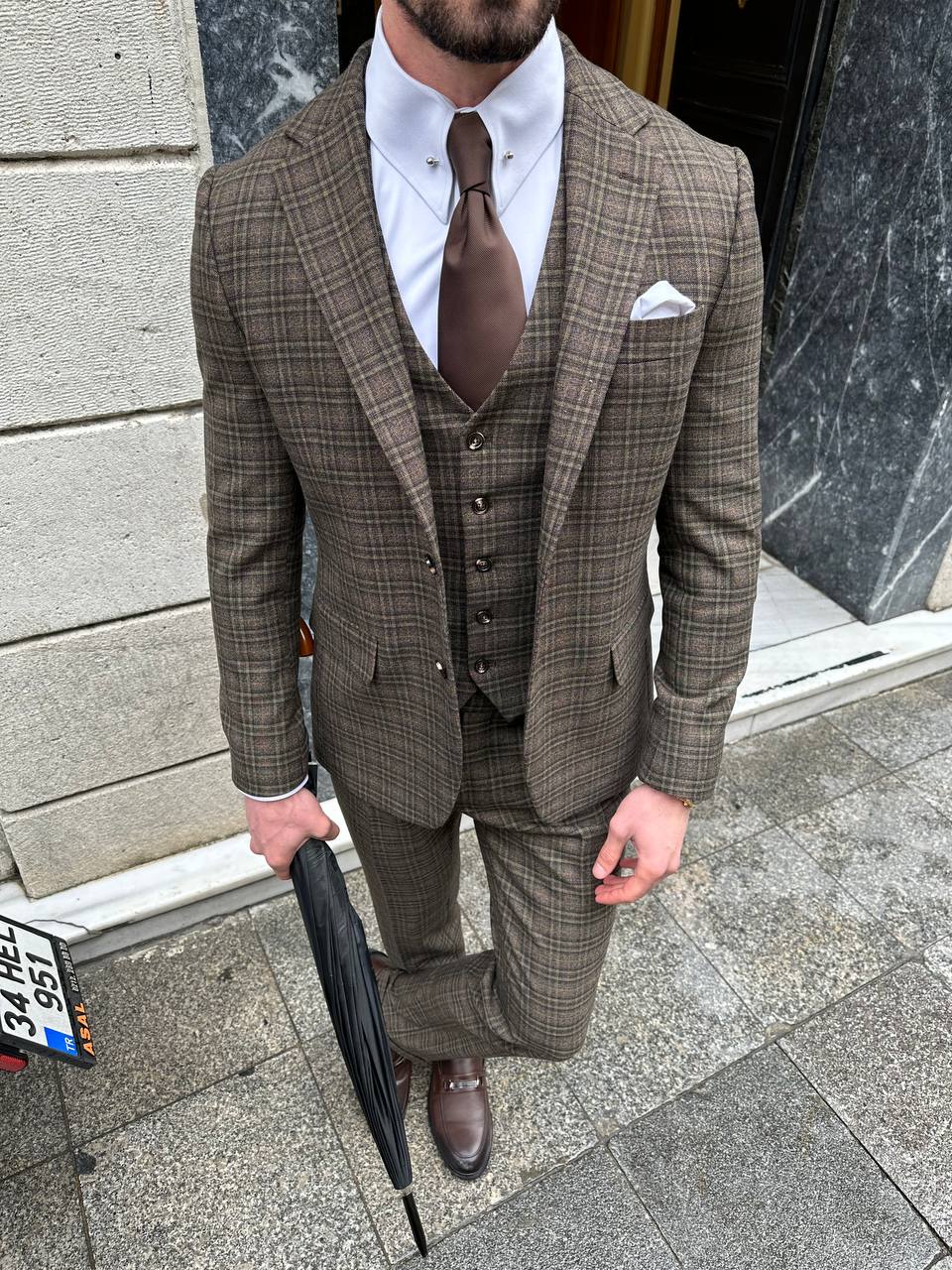 VIOSSI Brown Plaid Slim-Fit Suit 3-Piece worn lifestyle shot showcasing italian suit styles versatility