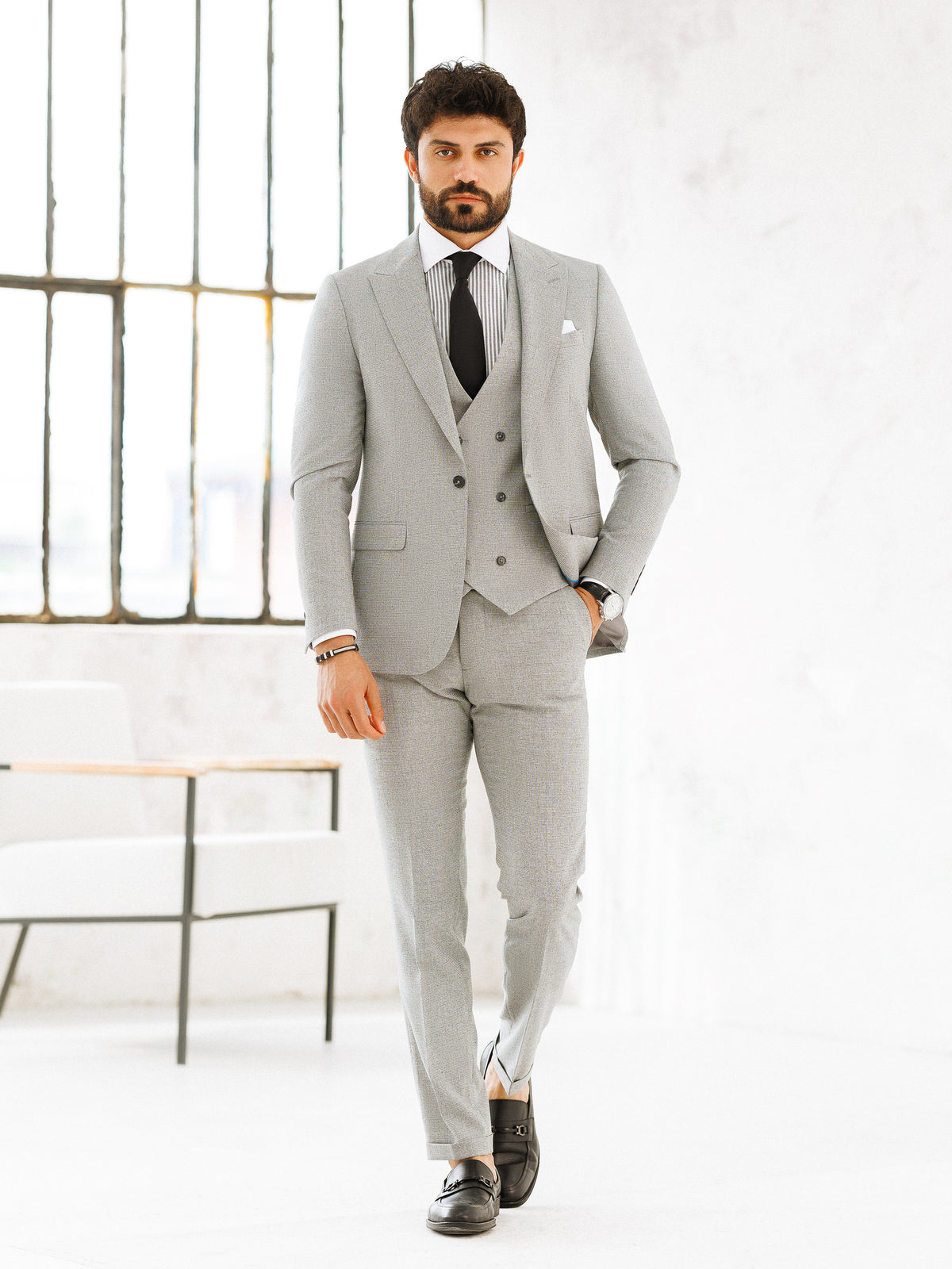 VIOSSI light grey slim-fit 3-piece suit detail of lapel and buttons - italian suit styles