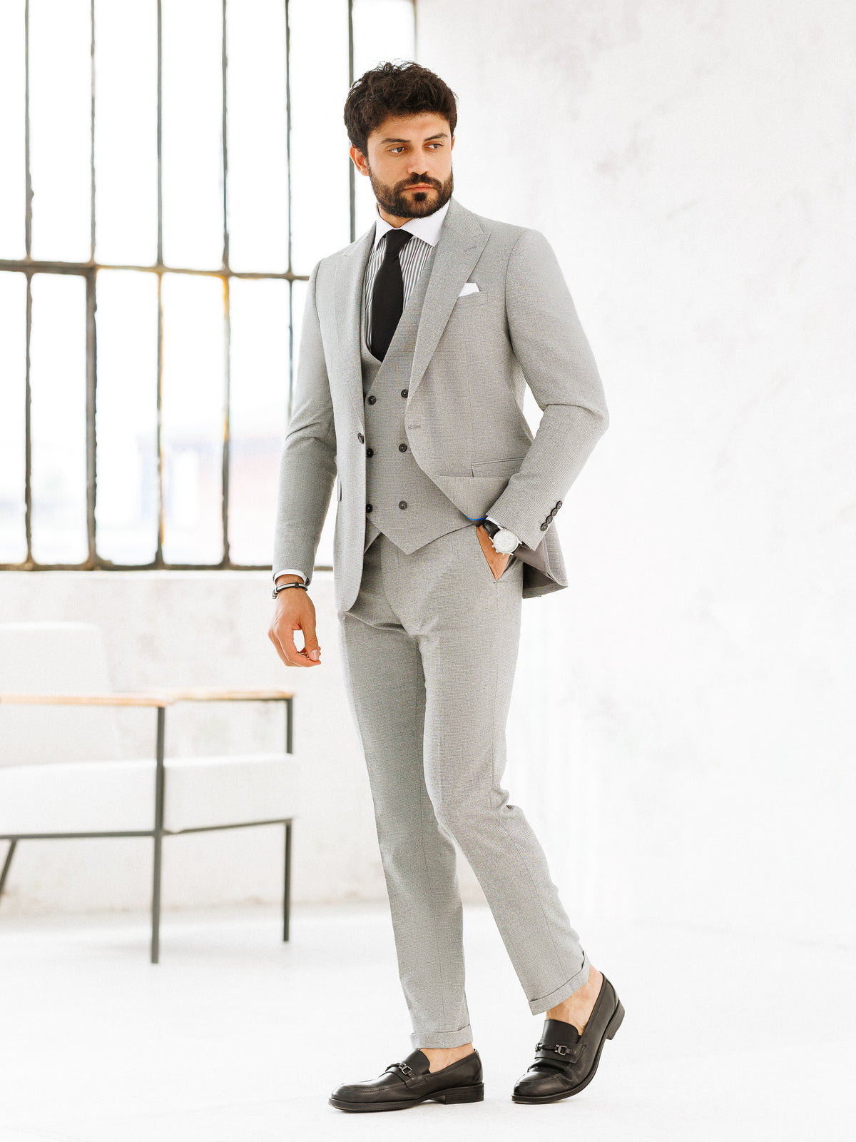 VIOSSI light grey slim-fit 3-piece suit back view showing tailored fit and Italian suit styles craftsmanship