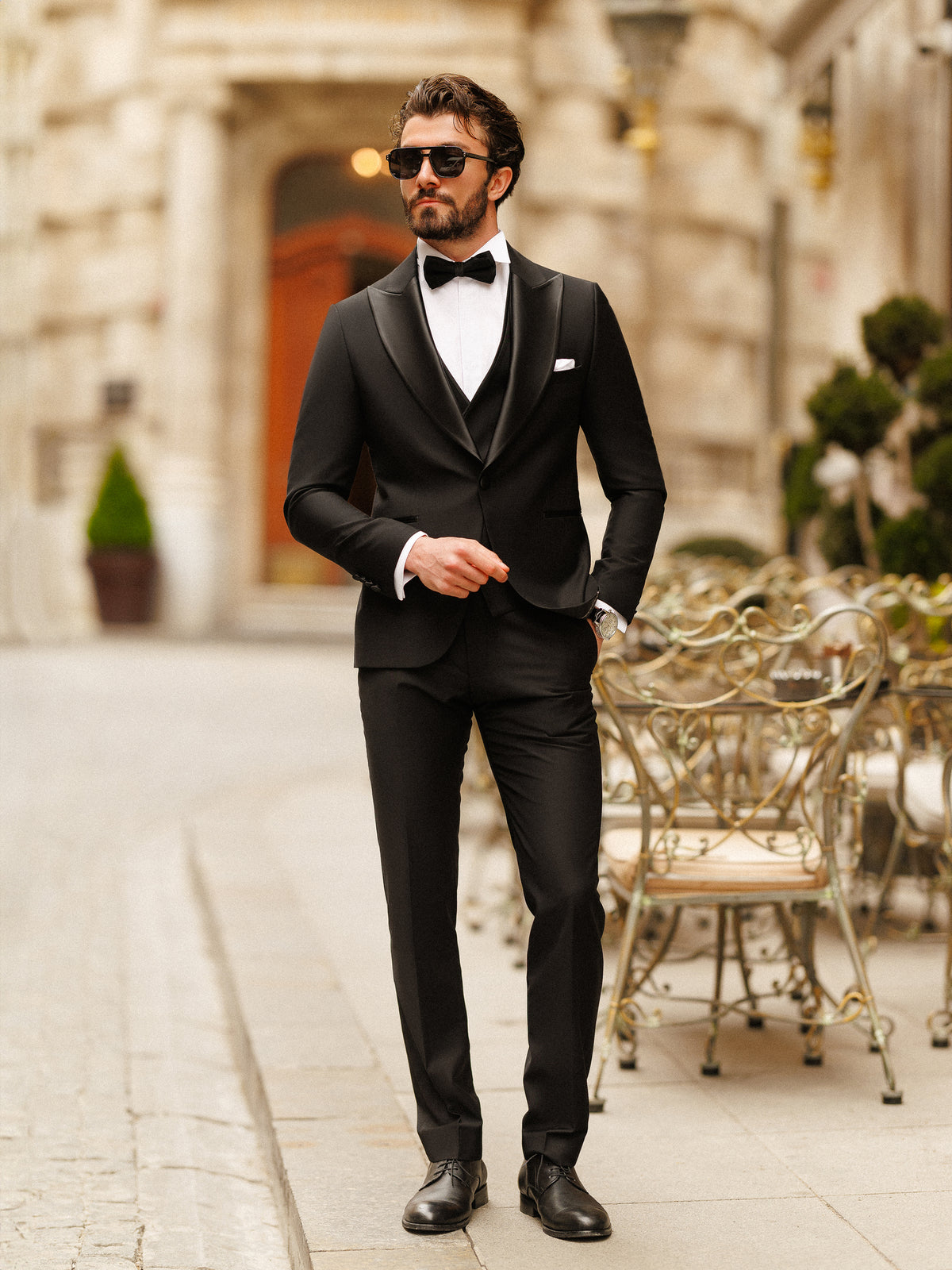 VIOSSI black slim-fit double breasted tuxedo styled look with bow tie and formal accessories complete outfit