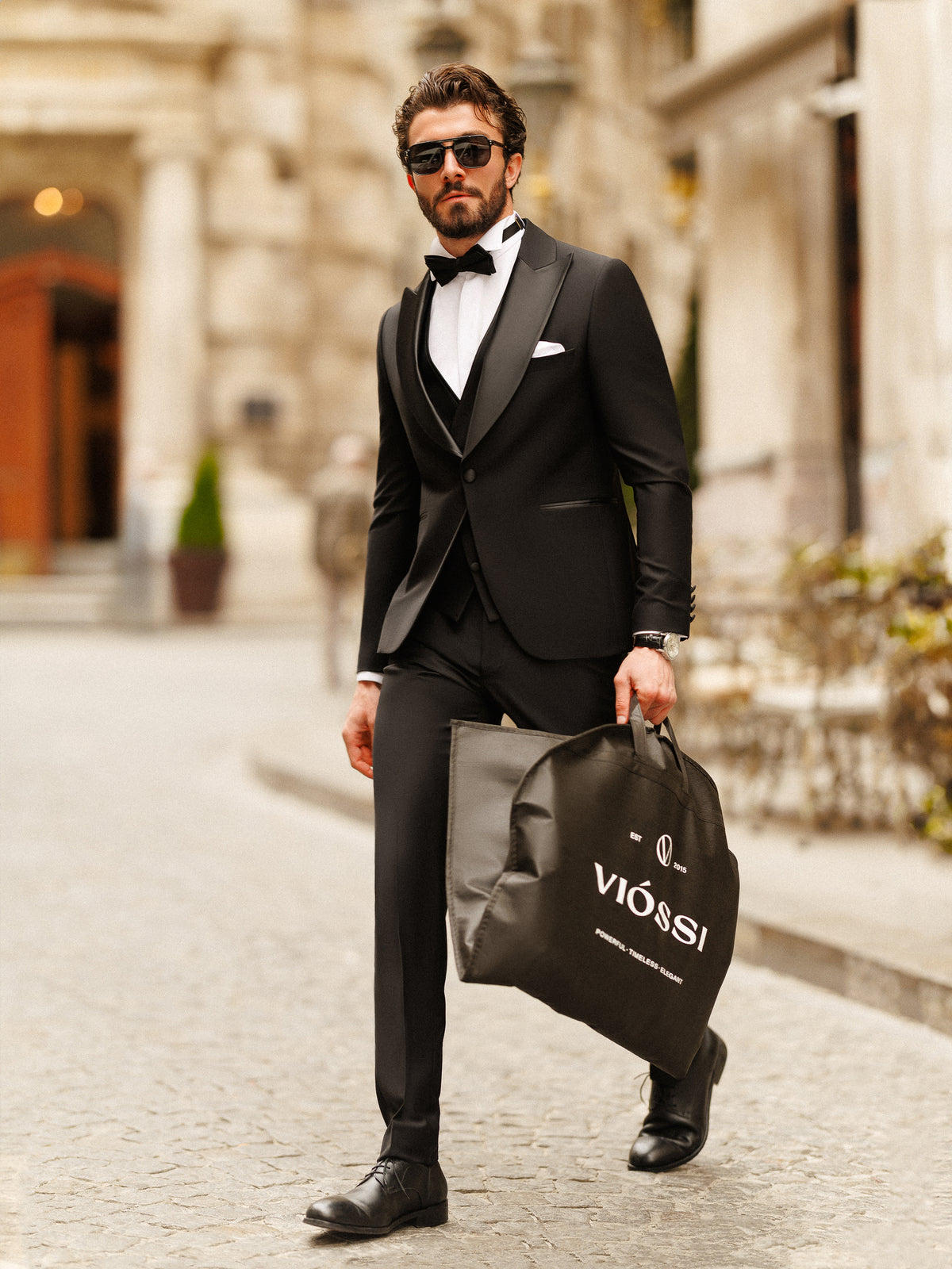 VIOSSI black slim-fit double breasted tuxedo side profile showing jacket silhouette